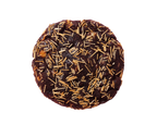 Chocolate cookie with gold sprinkles on a white background